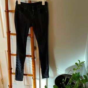 Buckle black skinny jeans